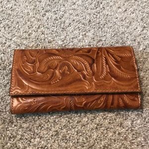 Patricia Nash tan tooled wallet.